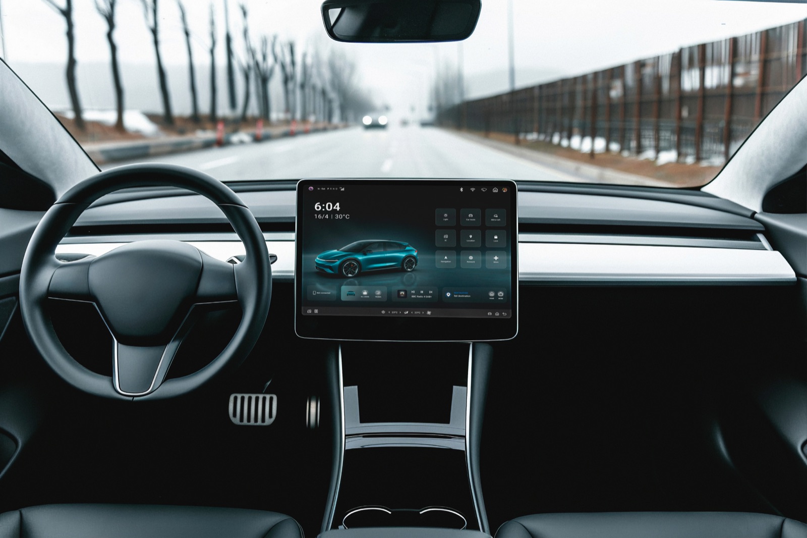 In-vehicle infotainment dashboard showing the driving mode screen, viewed from the driver's seat